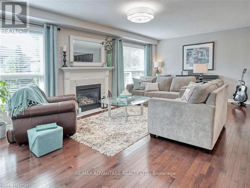 990 Foxcreek Road, London, ON - Indoor Photo Showing Living Room With Fireplace