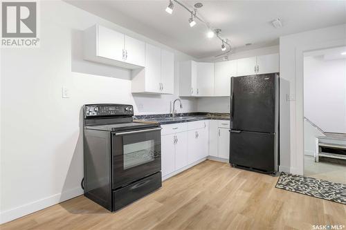 731 Retallack Street, Regina, SK - Indoor Photo Showing Kitchen With Double Sink