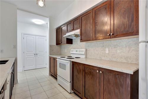 5070 Fairview Street|Unit #105, Burlington, ON - Indoor Photo Showing Kitchen With Double Sink