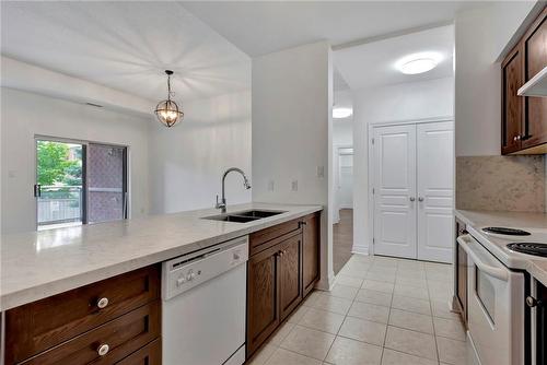 5070 Fairview Street|Unit #105, Burlington, ON - Indoor Photo Showing Kitchen With Double Sink