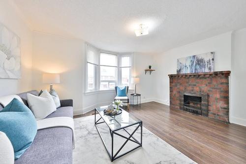 26 Blandford Street, Toronto, ON - Indoor Photo Showing Living Room With Fireplace