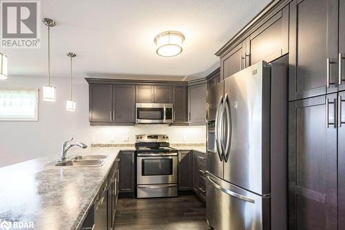 18 Tessa Boulevard, Belleville, ON - Indoor Photo Showing Kitchen With Stainless Steel Kitchen With Double Sink With Upgraded Kitchen