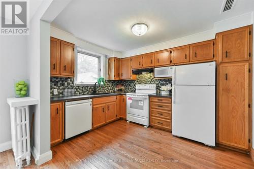 51 Denvale Road, Toronto, ON - Indoor Photo Showing Kitchen With Double Sink