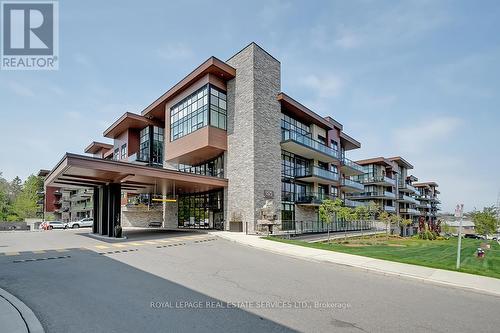 447 - 1575 Lakeshore Road W, Mississauga, ON - Outdoor With Balcony With Facade