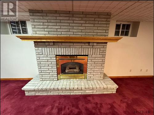 39 Harding Ave, Kirkland Lake, ON - Indoor Photo Showing Living Room With Fireplace