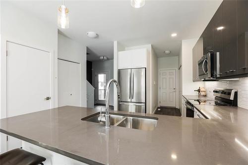 78 Cornerstone Heights, West St Paul, MB - Indoor Photo Showing Kitchen With Double Sink With Upgraded Kitchen