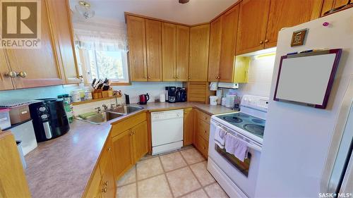 210 Main Street, Wawota, SK - Indoor Photo Showing Kitchen With Double Sink