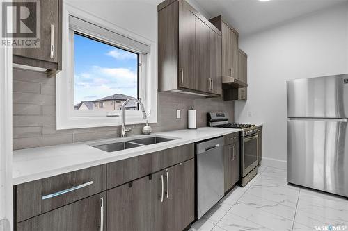 2247 Rosewood Drive, Saskatoon, SK - Indoor Photo Showing Kitchen With Double Sink