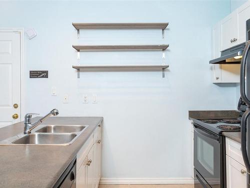 107-2823 Jacklin Rd, Langford, BC - Indoor Photo Showing Kitchen With Double Sink