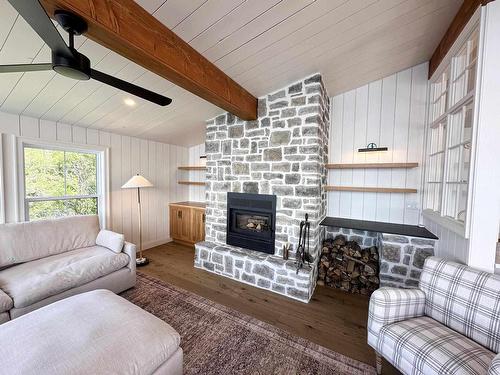 Lot 12 Zig Zag Island, Kenora, ON - Indoor Photo Showing Living Room With Fireplace