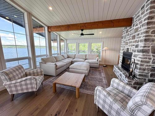 Lot 12 Zig Zag Island, Kenora, ON - Indoor Photo Showing Living Room With Fireplace