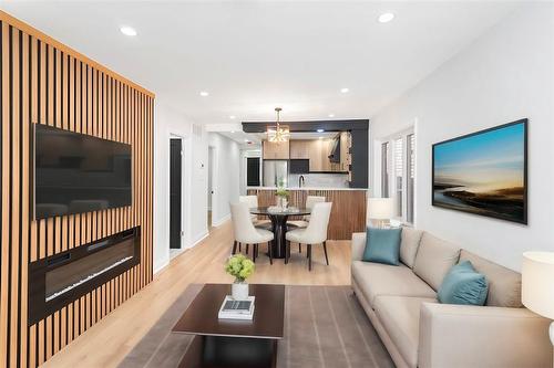 VIRTUALLY STAGED - 284 Grosvenor Avenue N, Hamilton, ON - Indoor Photo Showing Living Room