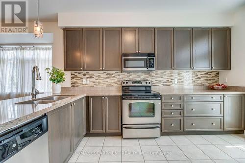 969 Reimer Common, Burlington, ON - Indoor Photo Showing Kitchen With Stainless Steel Kitchen With Double Sink With Upgraded Kitchen