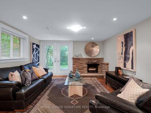 31 Woodthrush Crt, Toronto, ON - Indoor Photo Showing Living Room With Fireplace