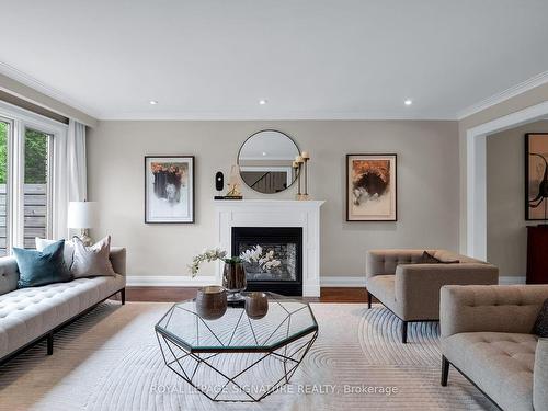 31 Woodthrush Crt, Toronto, ON - Indoor Photo Showing Living Room With Fireplace