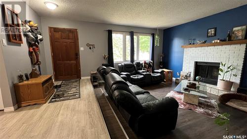 510 Wardlow Road, Saskatoon, SK - Indoor Photo Showing Living Room With Fireplace