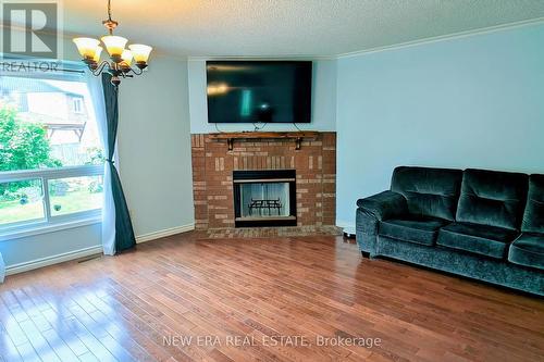 46 Vivians Crescent, Brampton, ON - Indoor Photo Showing Living Room With Fireplace