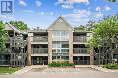 324 - 2030 Cleaver Avenue, Burlington, ON - Outdoor With Balcony With Facade