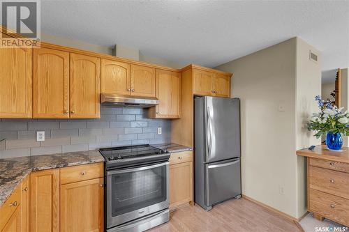 201 910 Heritage View, Saskatoon, SK - Indoor Photo Showing Kitchen With Stainless Steel Kitchen