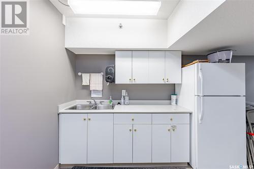 201 910 Heritage View, Saskatoon, SK - Indoor Photo Showing Kitchen With Double Sink