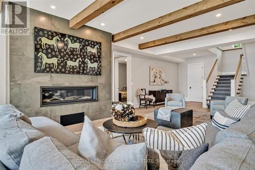 2491 Hiawatha Lane, Smith-Ennismore-Lakefield, ON - Indoor Photo Showing Living Room With Fireplace