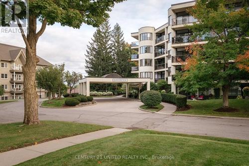 301 - 1818 Cherryhill Road, Peterborough, ON - Outdoor With Facade