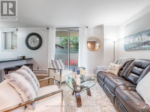 101 - 1145 Logan Avenue, Toronto, ON - Indoor Photo Showing Living Room
