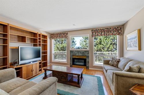800 Westpoint Drive, Kelowna, BC - Indoor Photo Showing Living Room With Fireplace