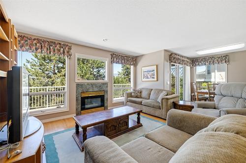 800 Westpoint Drive, Kelowna, BC - Indoor Photo Showing Living Room With Fireplace