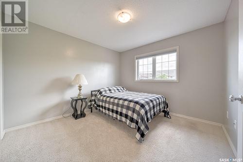 54 3101 Tregarva Drive E, Regina, SK - Indoor Photo Showing Bedroom