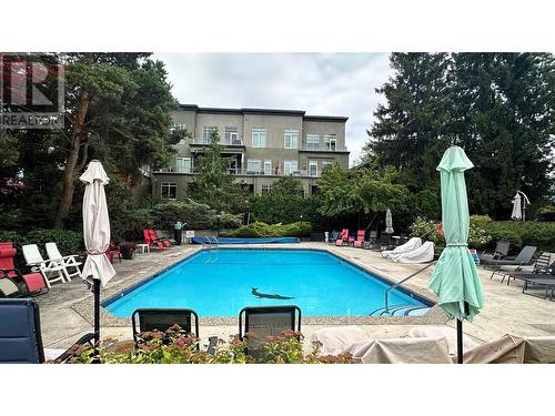 1056 Bernard Avenue Unit# 205, Kelowna, BC - Outdoor With In Ground Pool With Backyard