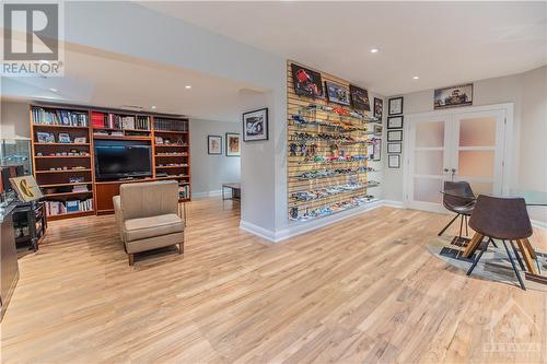 Lower level home office leads to the 4th bedroom. This space could easily function as bedroom with a spacious sitting area. - 6163 Pebblewoods Drive, Ottawa, ON - Indoor