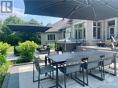 Rear yard patio, ideal for your seasonal enjoyment! - 6163 Pebblewoods Drive, Ottawa, ON - Outdoor With Deck Patio Veranda