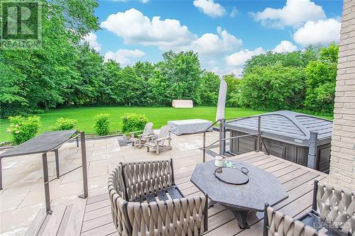 Patio installed in 2022 with new Trex decking and decorative handrails. - 6163 Pebblewoods Drive, Ottawa, ON - Outdoor With Deck Patio Veranda