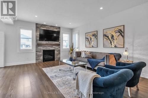 937 Lennon Way, London, ON - Indoor Photo Showing Living Room With Fireplace