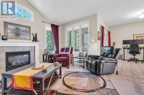 24 - 254 Summerfield Drive, Guelph, ON - Indoor Photo Showing Living Room With Fireplace