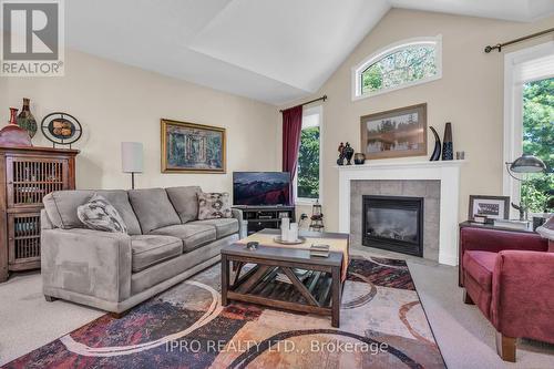 24 - 254 Summerfield Drive, Guelph, ON - Indoor Photo Showing Living Room With Fireplace