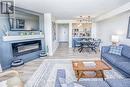 1411 - 3845 Lake Shore Boulevard, Toronto, ON  - Indoor Photo Showing Living Room With Fireplace 