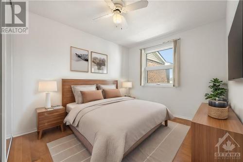 This photo has been virtually staged. - 4 Castlebrook Lane Unit#C, Ottawa, ON - Indoor Photo Showing Bedroom