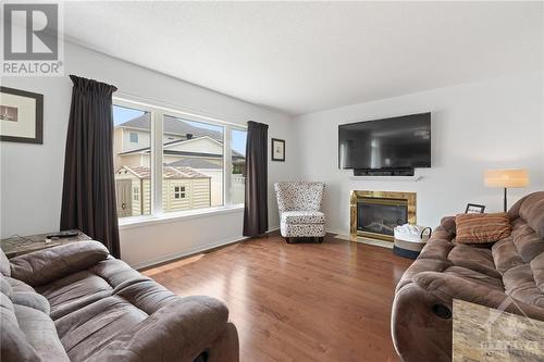 1022 Unicorn Avenue, Ottawa, ON - Indoor Photo Showing Living Room With Fireplace