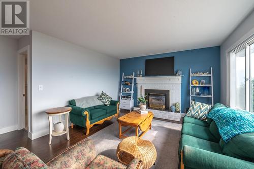 3218 West Bench Drive, Penticton, BC - Indoor Photo Showing Living Room With Fireplace