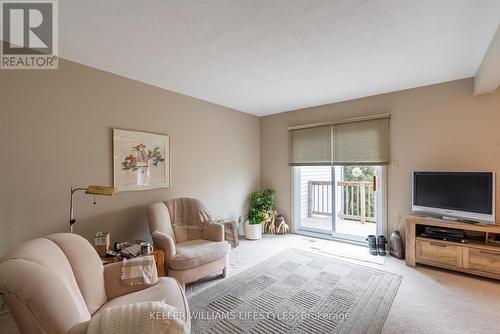 Family Room Balcony Access - 64 Mcmaster Crescent, London, ON - Indoor Photo Showing Living Room