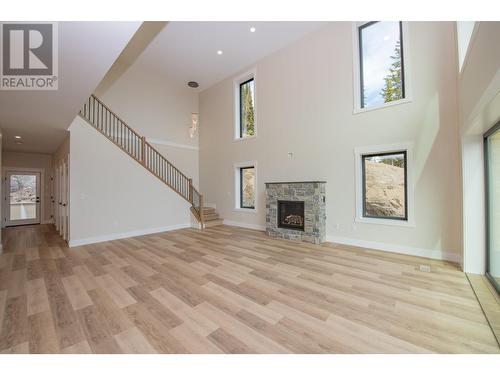 9993 Cathedral Drive, Vernon, BC - Indoor With Fireplace