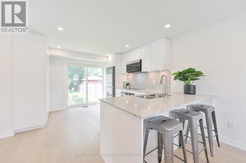 22 Donora Drive, Toronto, ON - Indoor Photo Showing Kitchen With Double Sink