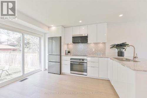 22 Donora Drive, Toronto, ON - Indoor Photo Showing Kitchen With Double Sink With Upgraded Kitchen
