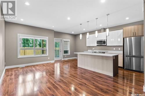 60 1550 Paton Crescent, Saskatoon, SK - Indoor Photo Showing Kitchen With Stainless Steel Kitchen With Upgraded Kitchen