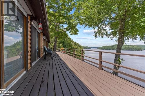 Ample space for outdoor entertaining - 303 Etwell Road, Huntsville, ON - Outdoor With Body Of Water With Deck Patio Veranda With View