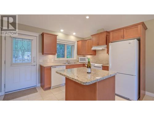 4433 Gordon Drive Unit# 212, Kelowna, BC - Indoor Photo Showing Kitchen With Double Sink