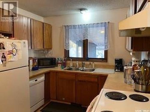 920 Quandt Crescent, La Ronge, SK - Indoor Photo Showing Kitchen With Double Sink