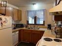 920 Quandt Crescent, La Ronge, SK  - Indoor Photo Showing Kitchen With Double Sink 